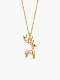 Dainty 18K gold plated deer pendant necklace isolated on a clean white background