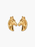 Pair of sculpted 18K gold plated horse earrings facing each other on a neutral background
