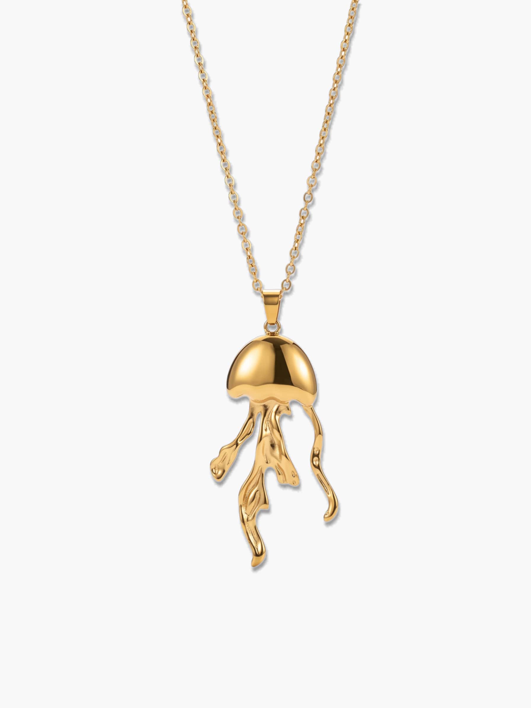 A close-up studio shot of a premium 18K gold-plated jellyfish necklace pendant hanging on a delicate gold chain against a clean, light gray background