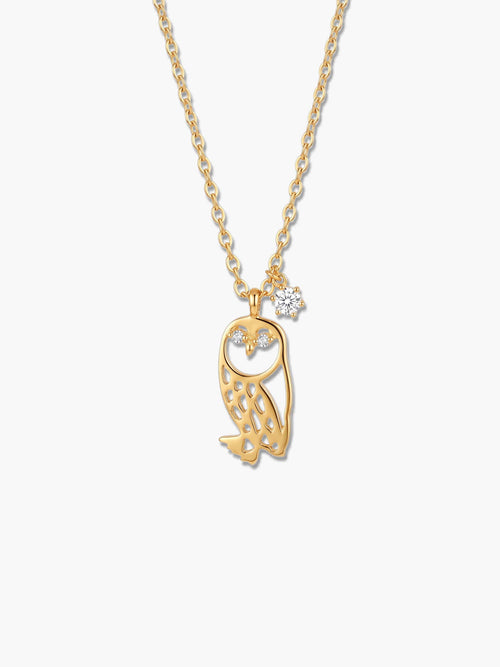 Front view of the 18K gold plated owl pendant necklace featuring delicate cutout details and a sparkling cubic zirconia charm on a clean background