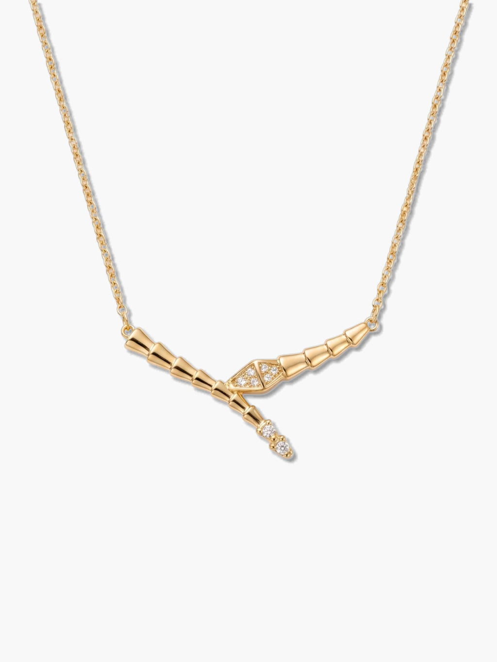 A high-resolution studio shot of an 18K gold-plated snake necklace featuring a sleek, segmented textured design and sparkling cubic zirconia stones on a clean white background