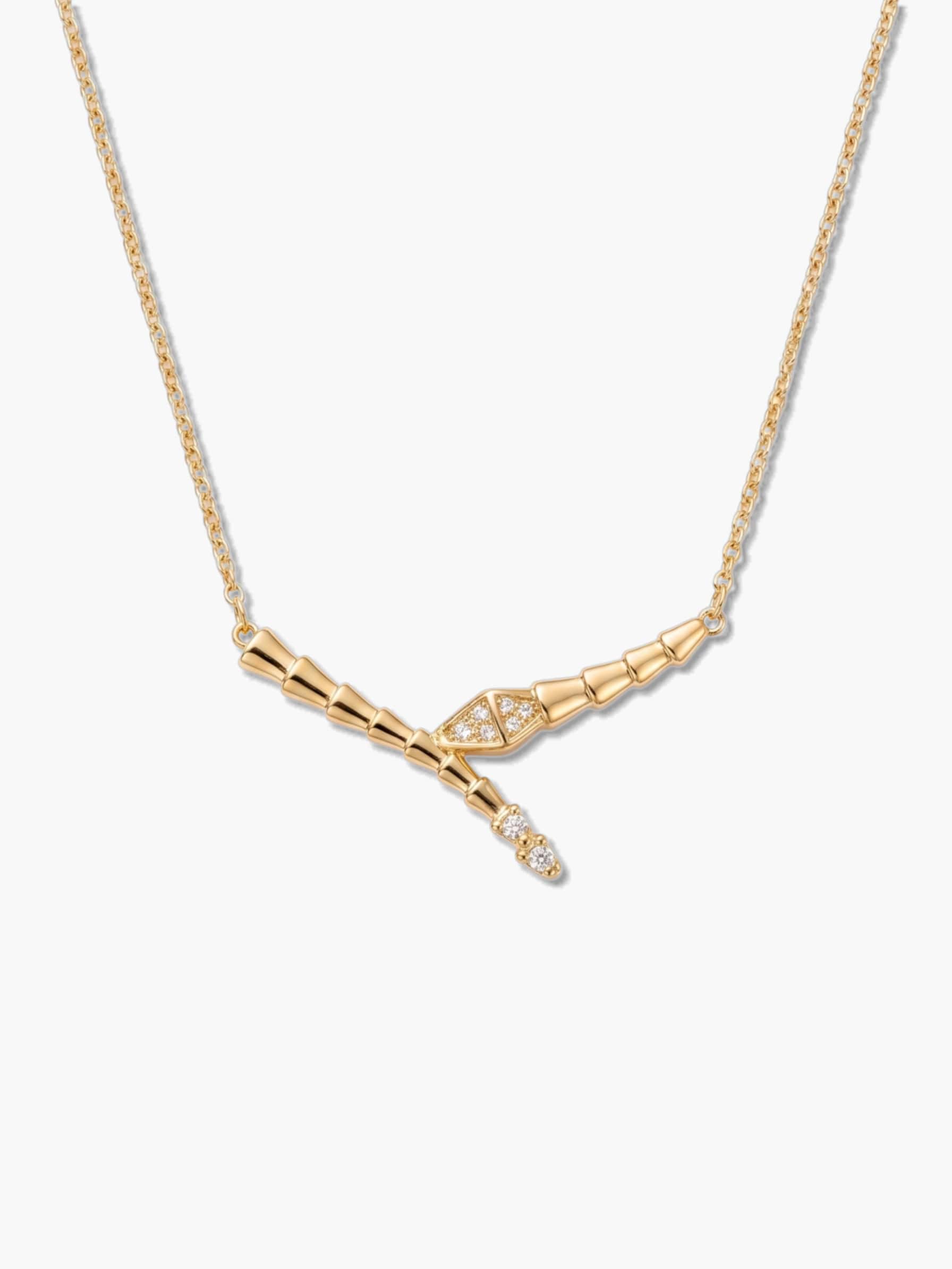 A high-resolution studio shot of an 18K gold-plated snake necklace featuring a sleek, segmented textured design and sparkling cubic zirconia stones on a clean white background