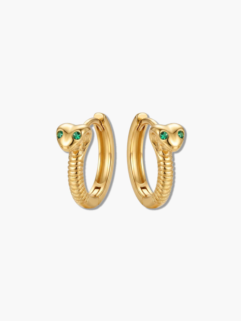 Pair of 18K gold snake earrings with emerald green cubic zirconia eyes on a white background