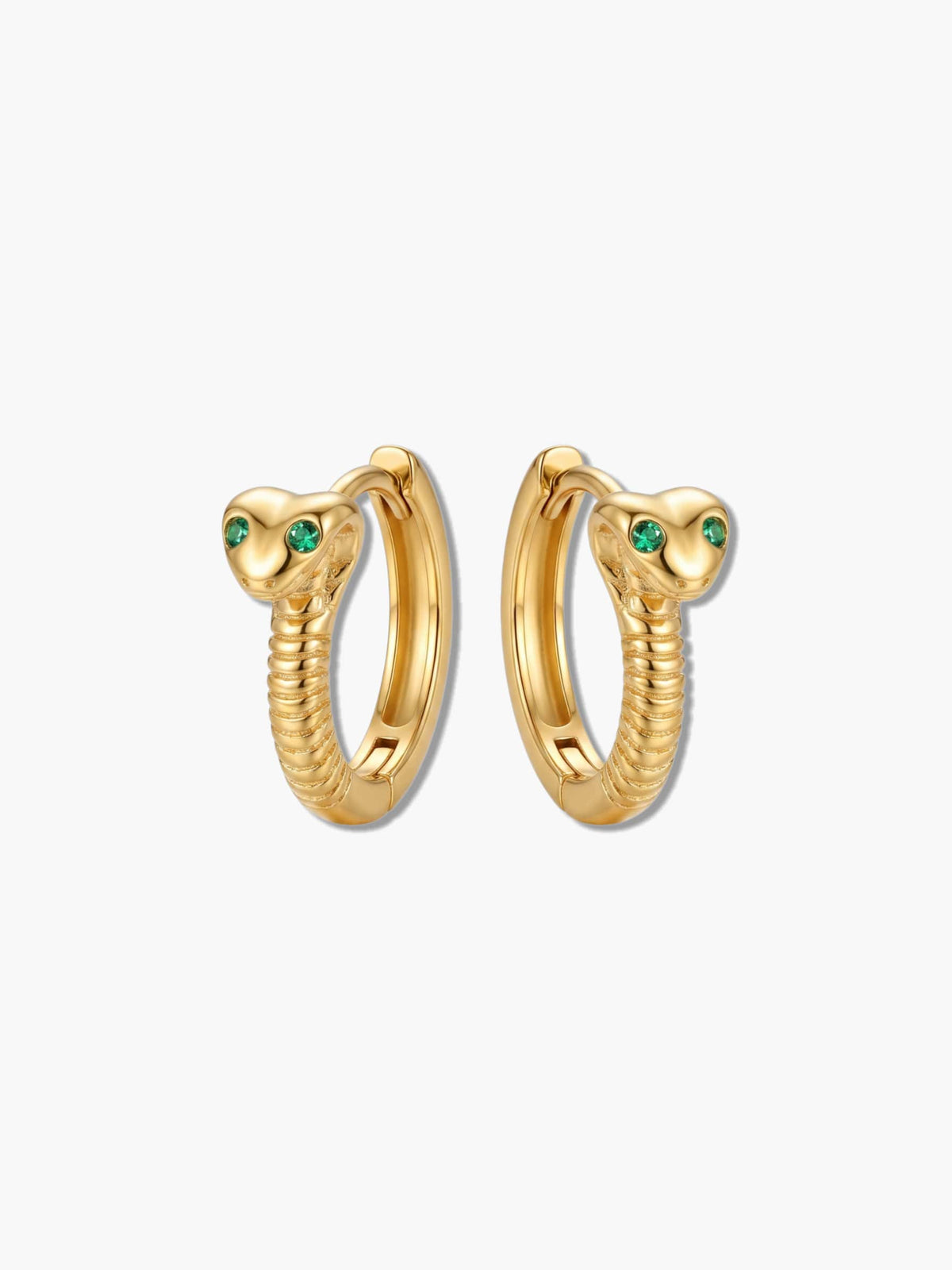 Pair of 18K gold snake earrings with emerald green cubic zirconia eyes on a white background