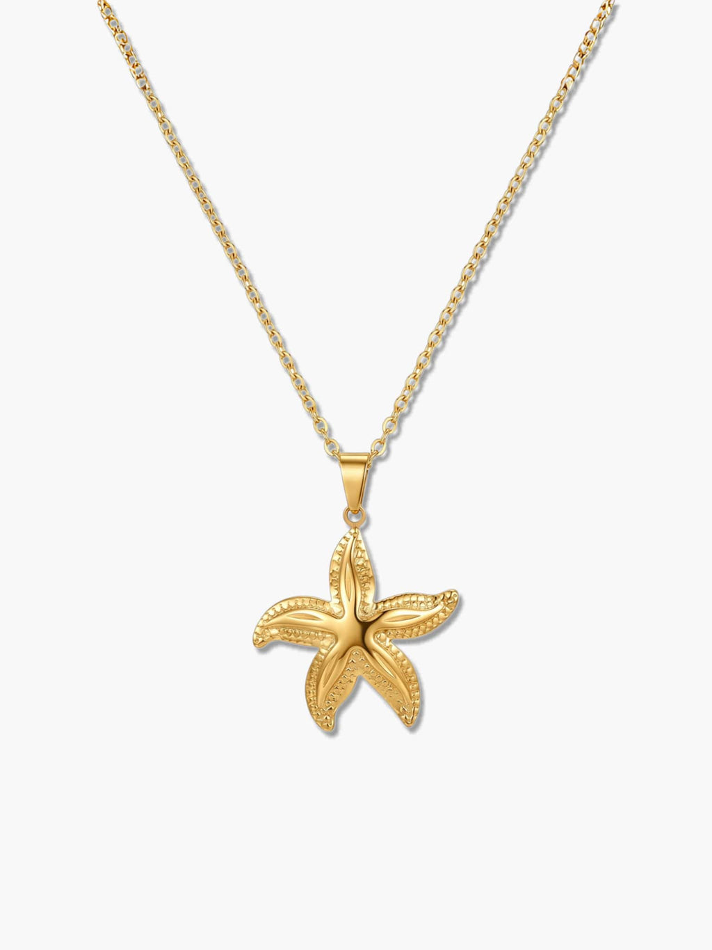 A detailed product shot of an 18K gold starfish necklace with an intricately textured star pendant on a delicate gold chain over a white background