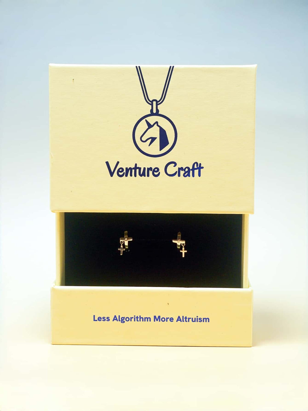 Venture Craft jewelry set with necklace and earrings in a box on a light blue background