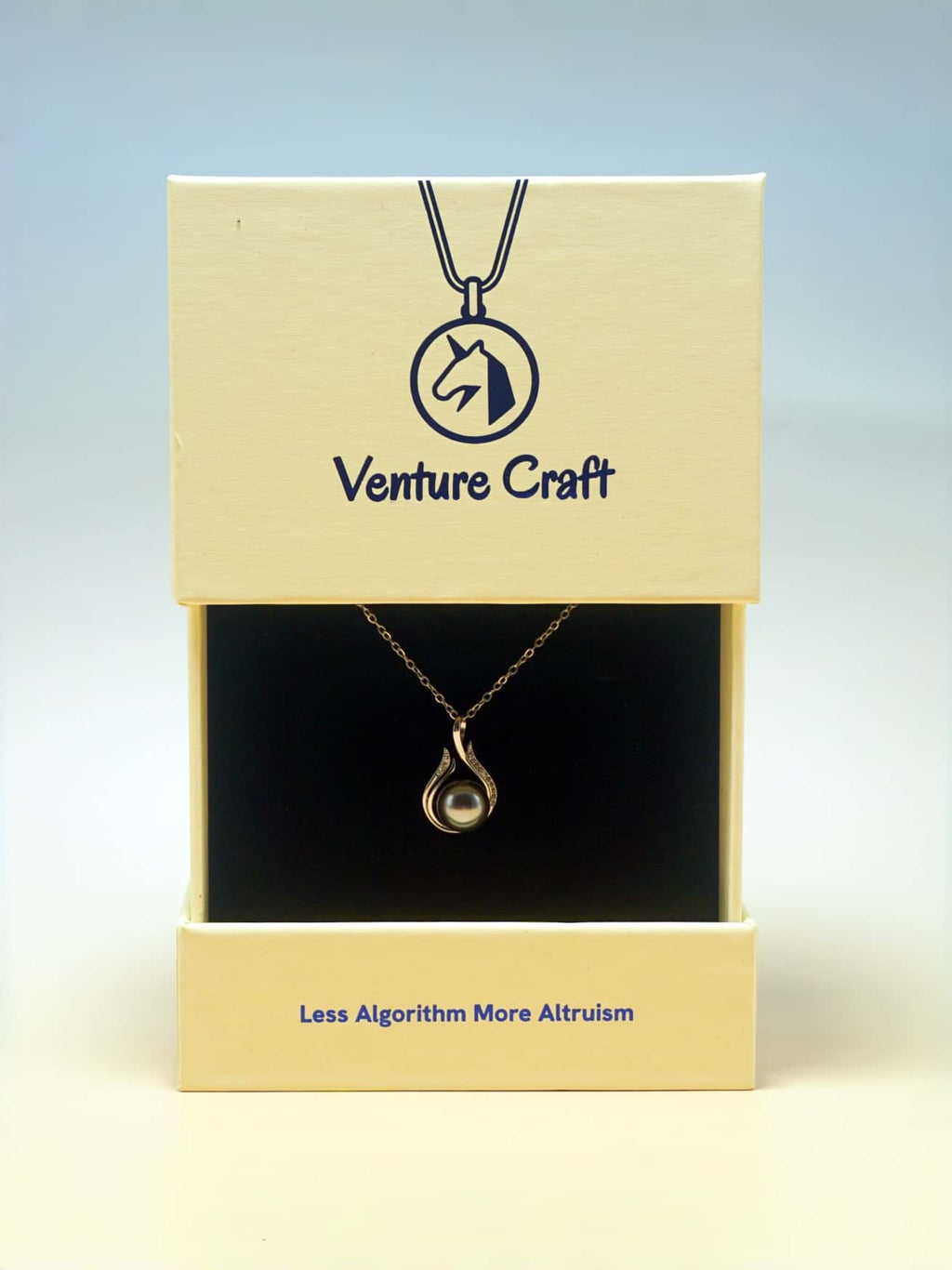Necklace in a 'Venture Craft' box with a blue background