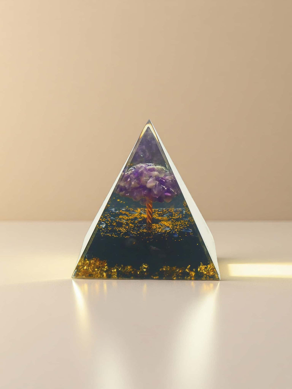 Triangular crystal with a purple crystal and fiery design on a beige background