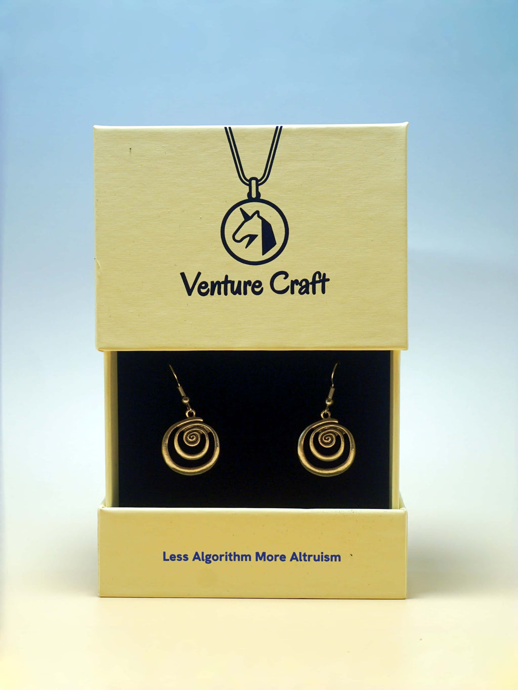 Jewelry set in a 'Venture Craft' box with a blue gradient background