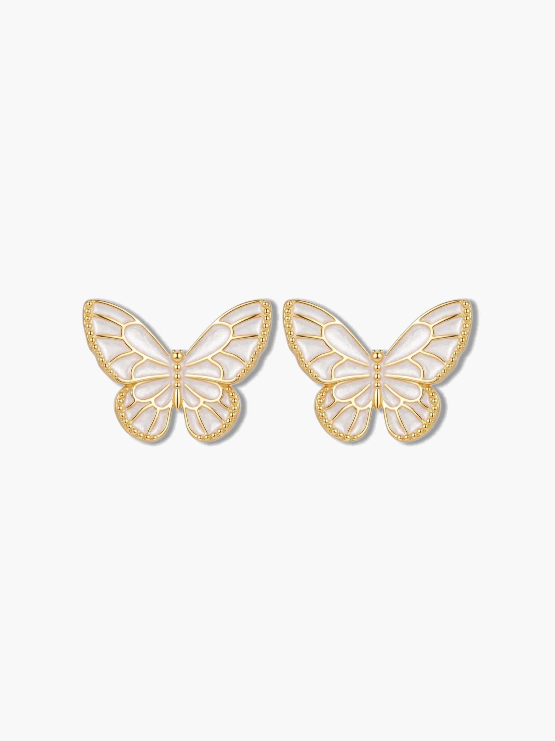 Front-facing studio product photography of a pair of minimalist butterfly stud earrings on a pure white background for ecommerce catalog