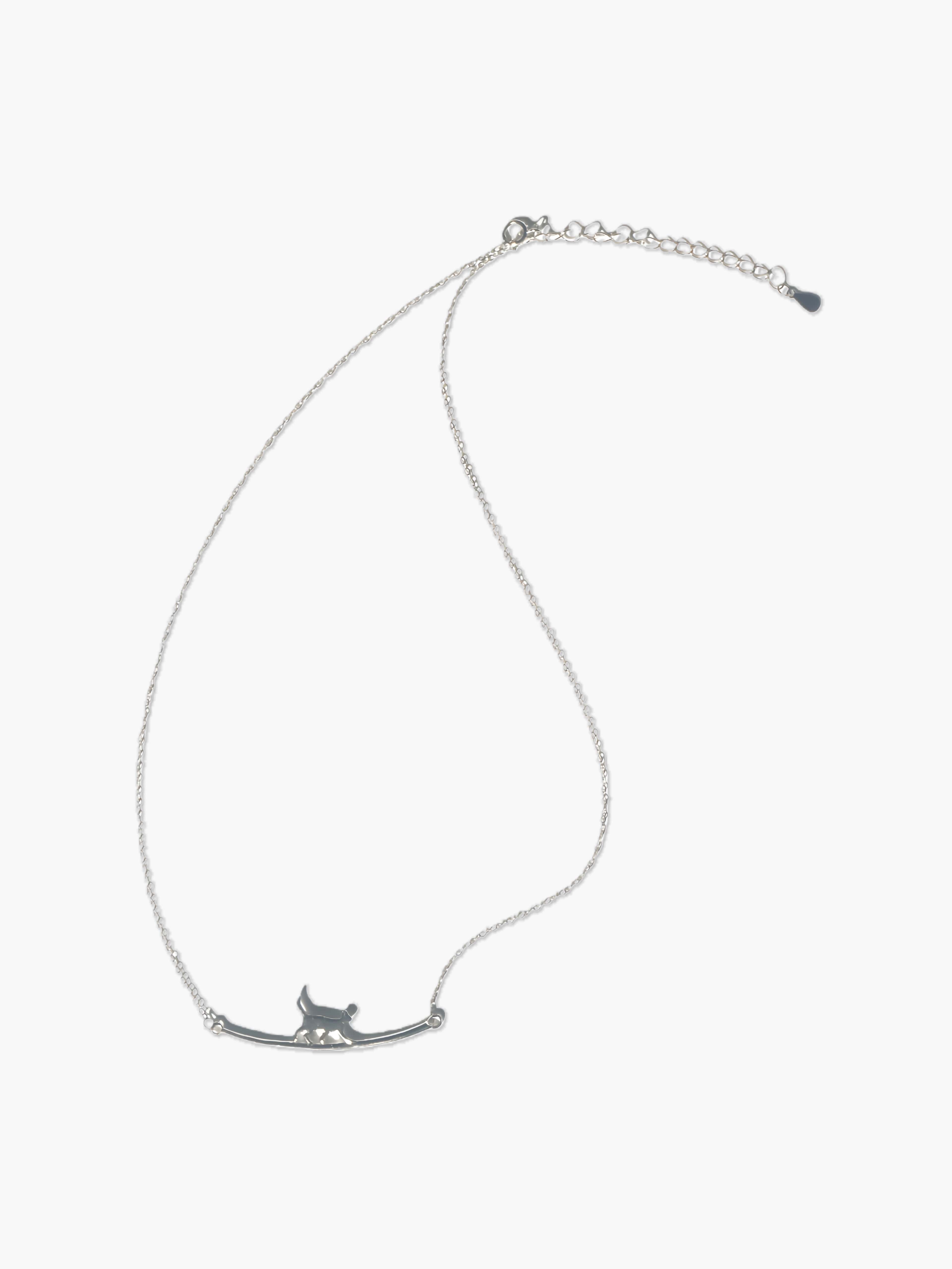 sterling silver necklace with a cat pendant on a white background