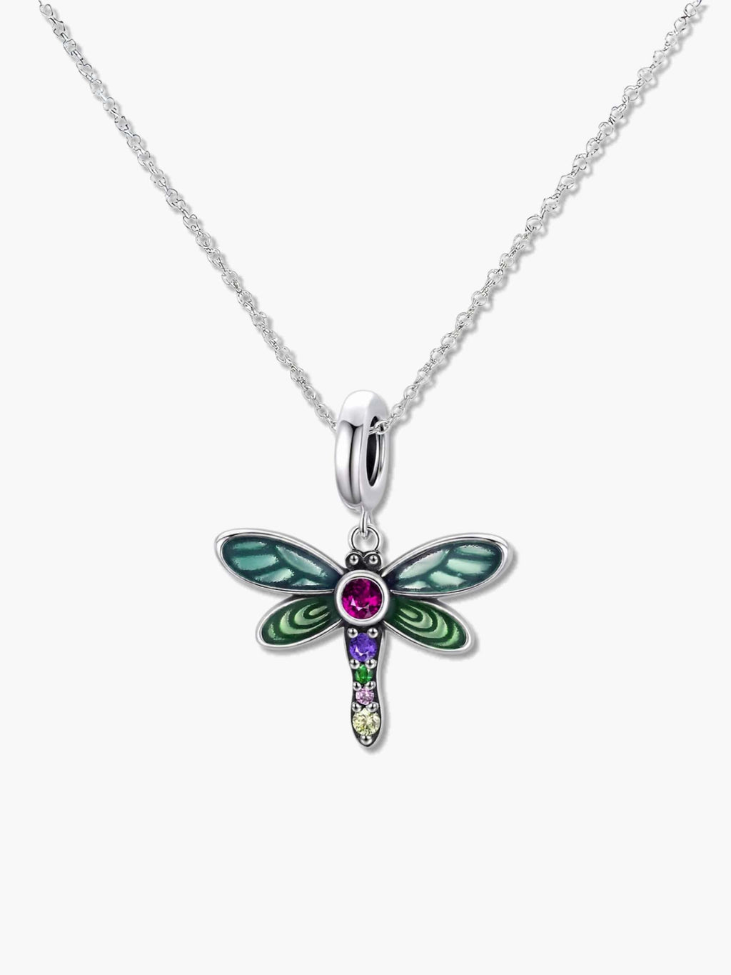 A high-quality studio shot of a dragonfly pendant necklace with vibrant green enamel wings and multi-colored cubic zirconia gemstones on a silver chain