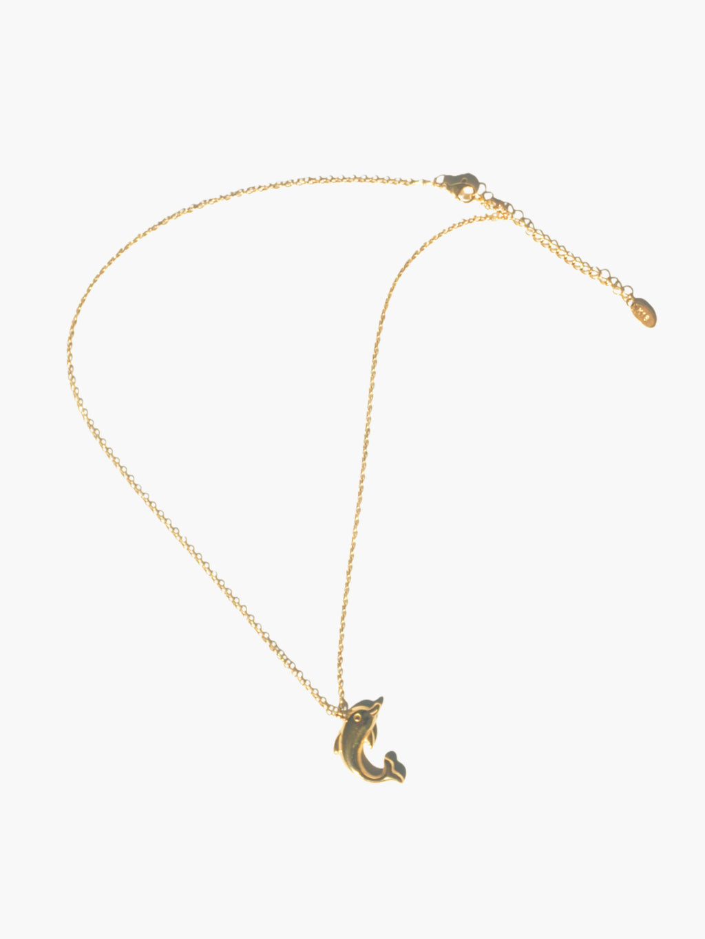Gold necklace with a crescent dolphin pendant on a white background