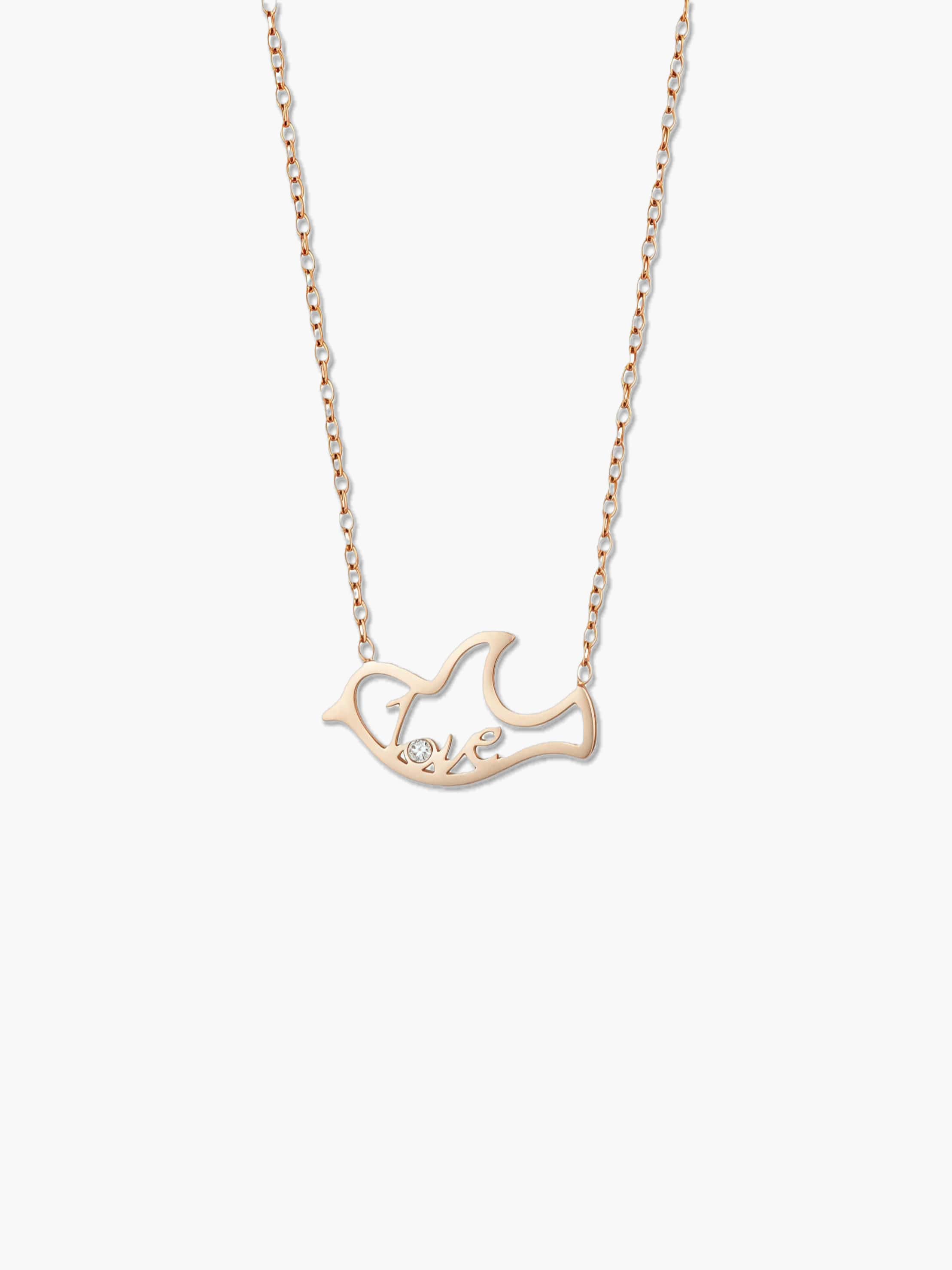 Gold dove pendant necklace on a white background