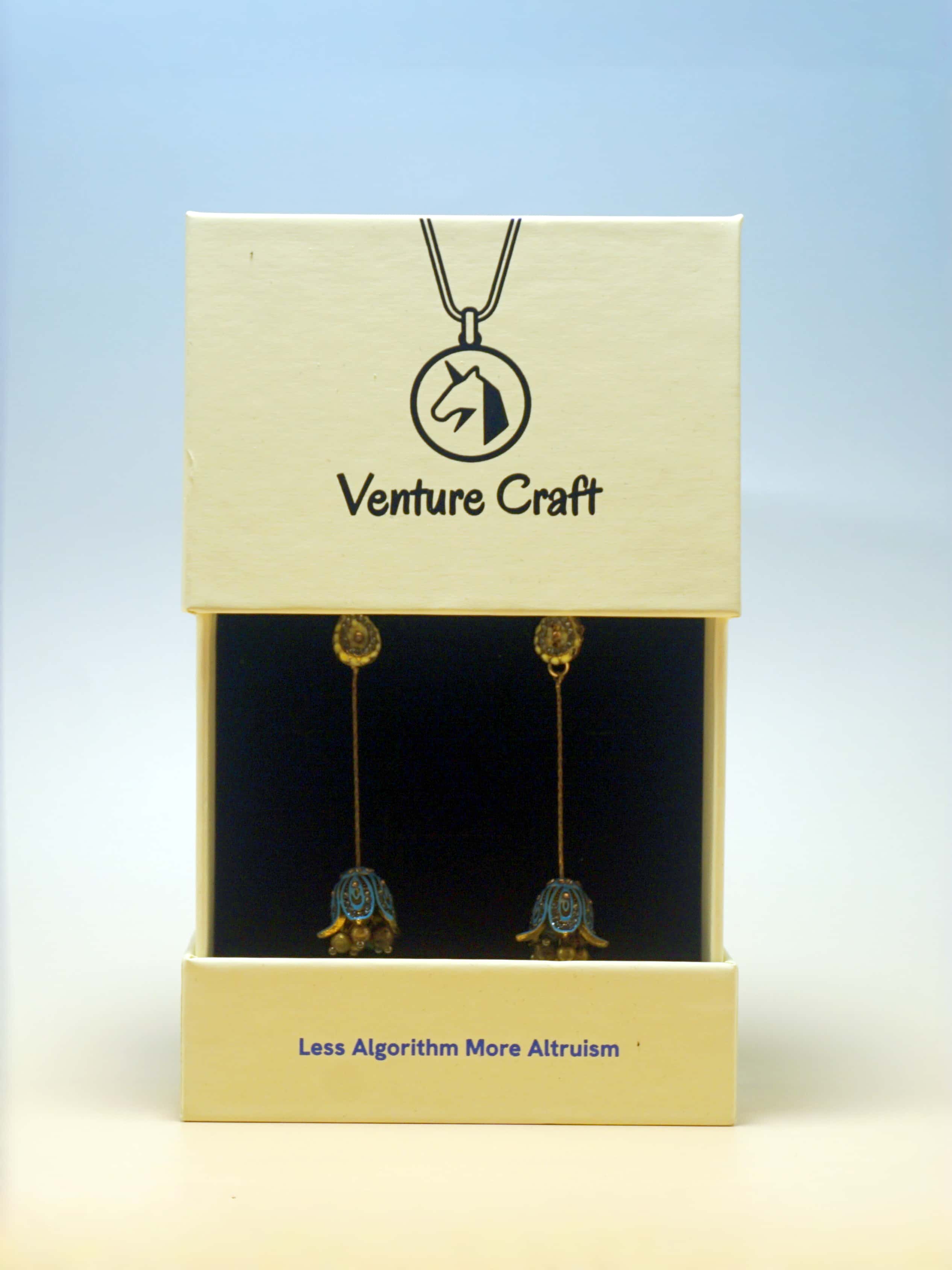 Venture Craft necklace packaging with two necklaces on a light blue background