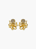 Gold octopus earrings with gemstone details on a white background