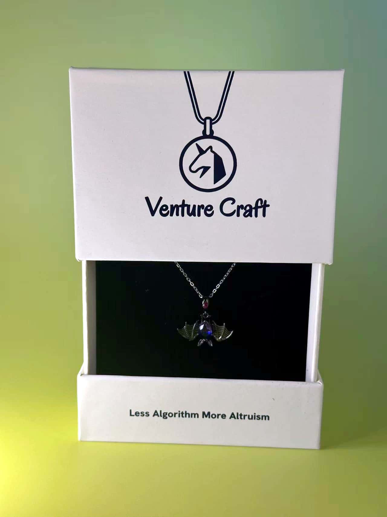 Gothic bat necklace beautifully displayed in a white Venture Craft jewelry gift box ready for unboxing
