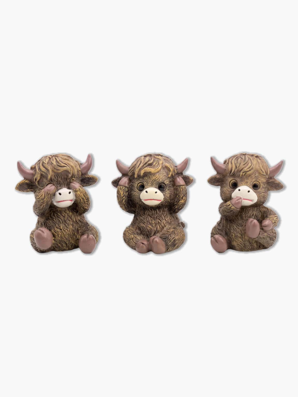 Set of three cute mini highland cow figurines in see no evil hear no evil speak no evil poses on white background
