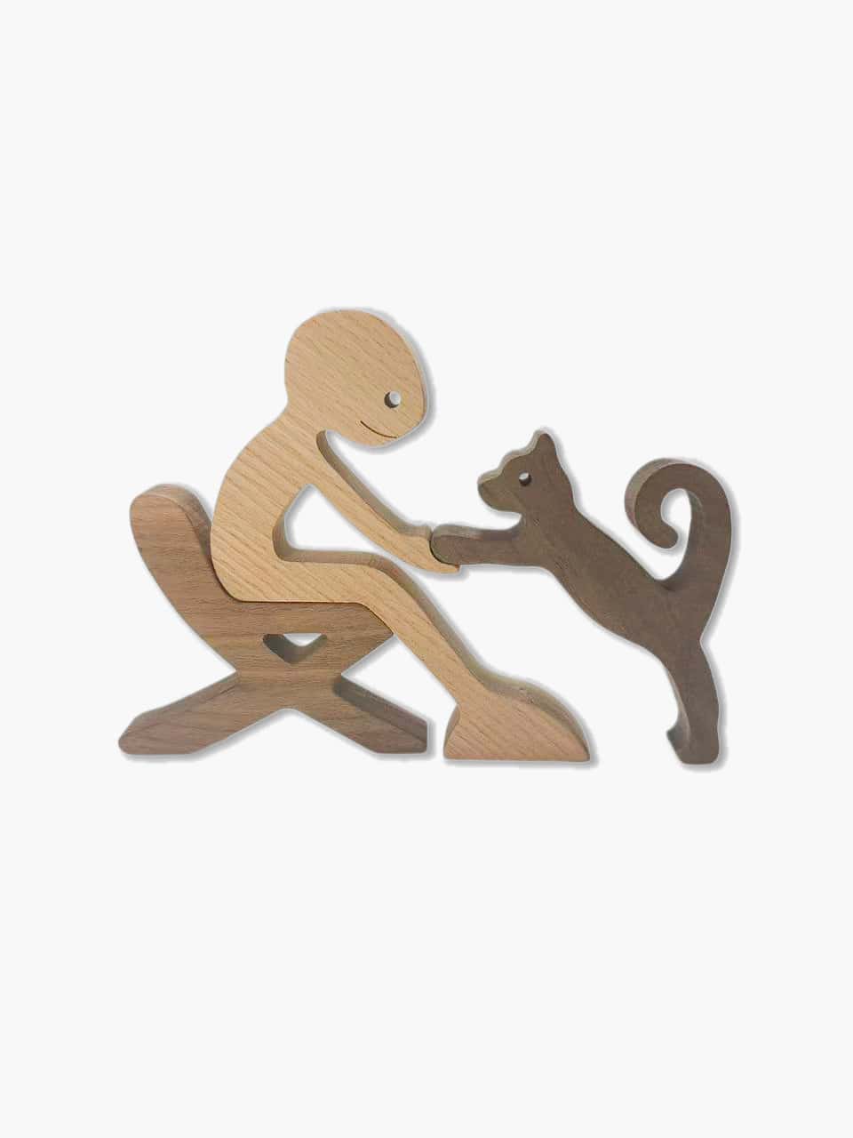 Front view of a minimalist wood sculpture featuring a human figure petting a cat, seamlessly interlocking light beech and dark walnut wood.
