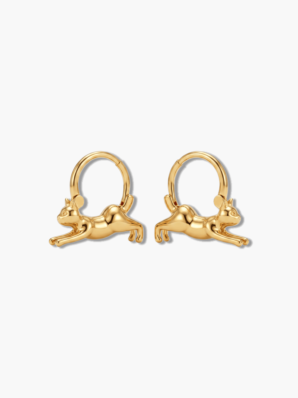 Pair of 18K gold plated leaping cat hoop earrings on a clean white background