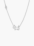 Clean product shot of a minimalist sterling silver dog necklace isolated on a crisp white background.