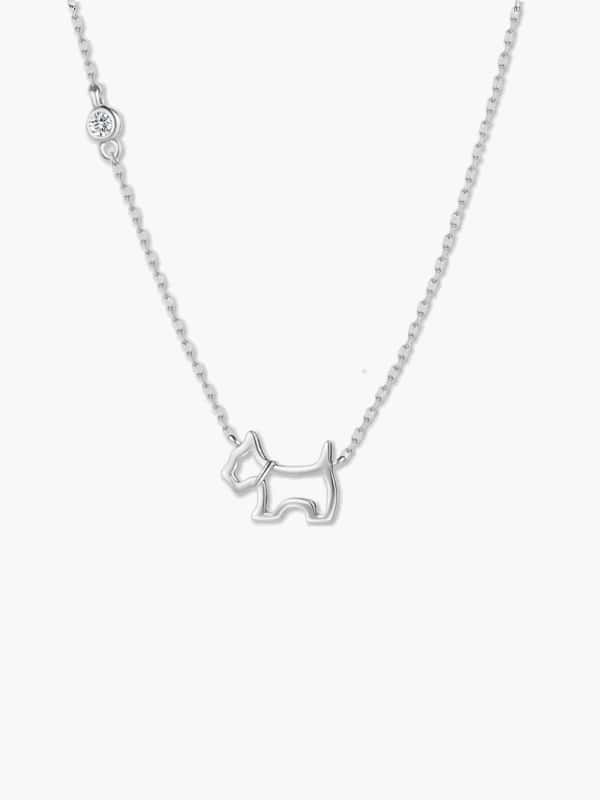 Clean product shot of a minimalist sterling silver dog necklace isolated on a crisp white background.