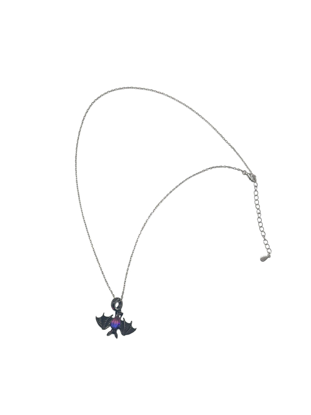 Full length view of a bat necklace silver piece showing the dark pendant and its adjustable sterling silver chain