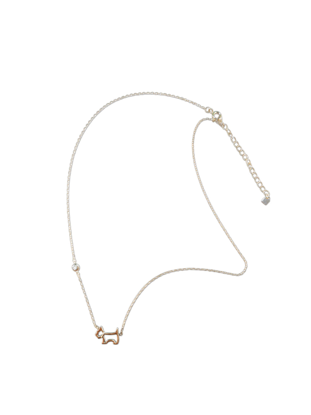 Full flat lay view of a delicate sterling silver dog necklace featuring a cutout puppy design and a bezel-set cubic zirconia accent.