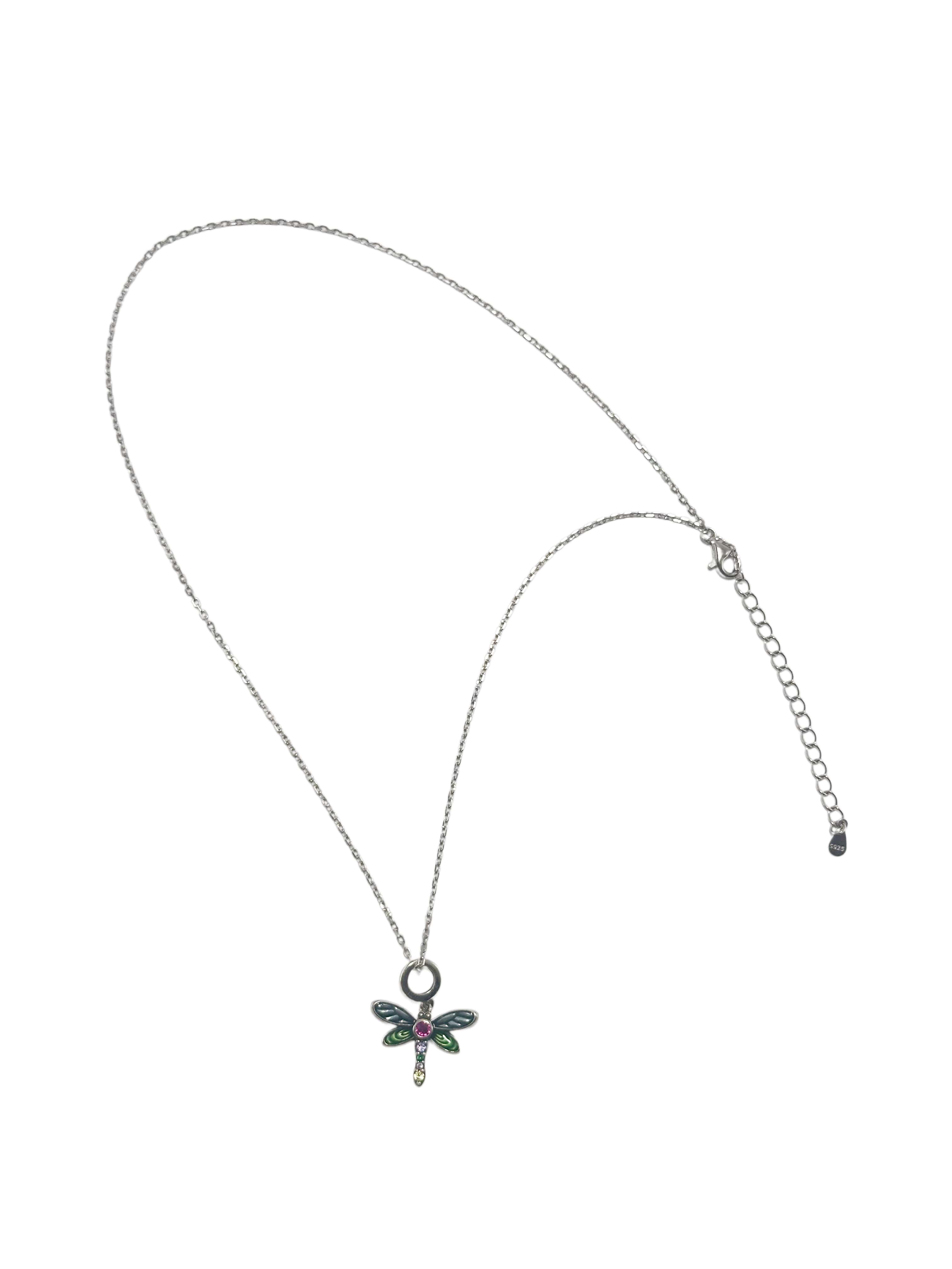A full flat-lay view of a delicate sterling silver dragonfly necklace featuring an adjustable chain and a colorful enamel pendant