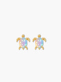 sterling silver sea turtle earrings with iridescent centers on a white background
