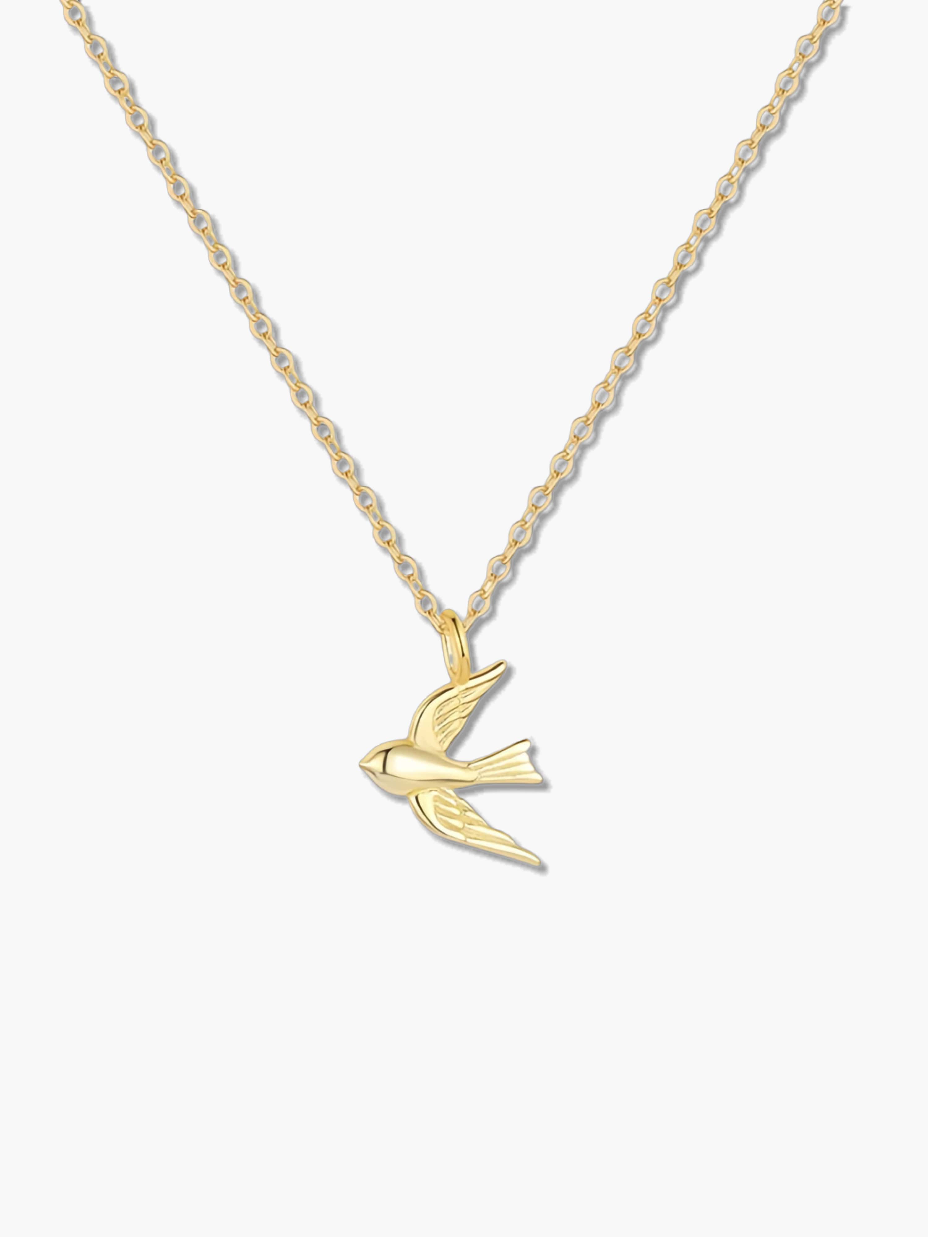 18K gold swallow bird necklace on a white background