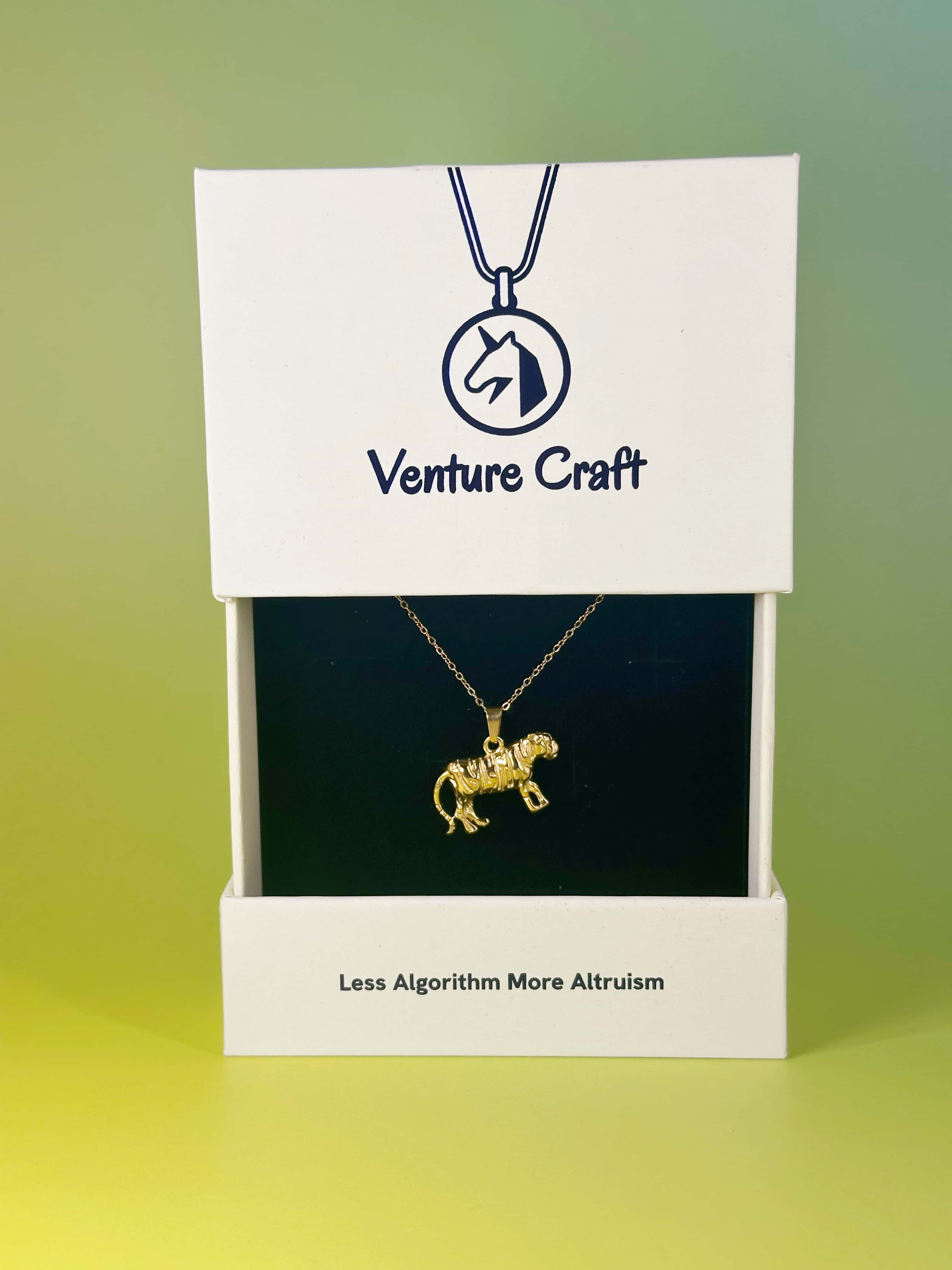 The gold tiger necklace beautifully presented in a Venture Craft branded gift box, ready for unboxing